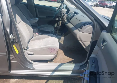 2005 Toyota Camry Le z USA, uszkodzony, nr VIN 4T1BE30K85U532198